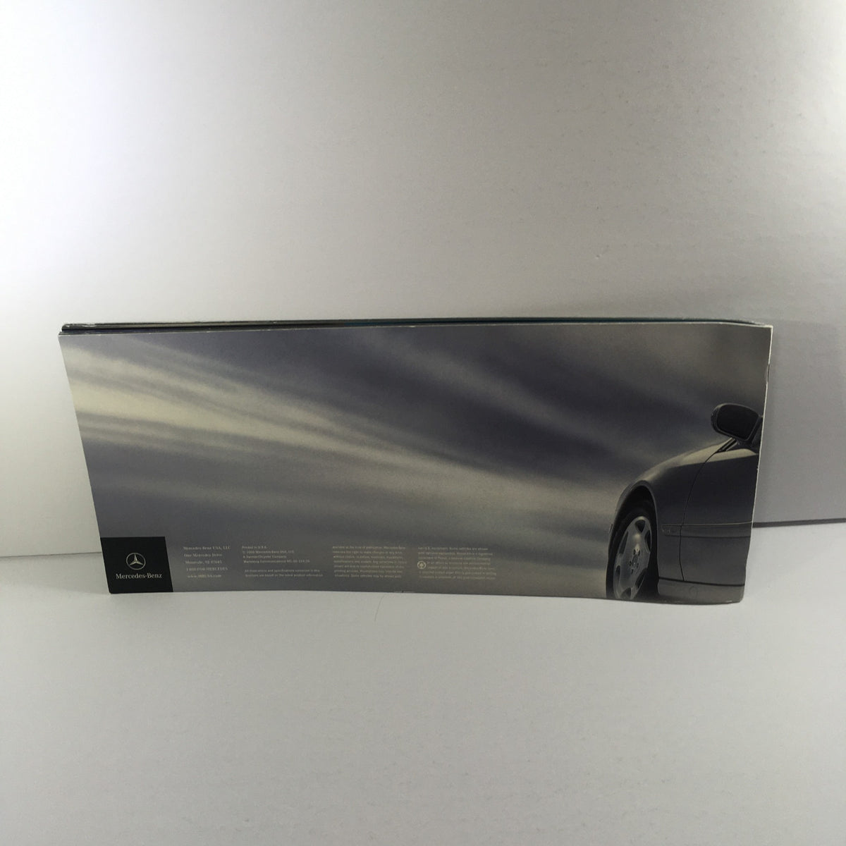 Side view of the 2001 Mercedes-Benz CL-Class shown in the catalog with a sleek design.