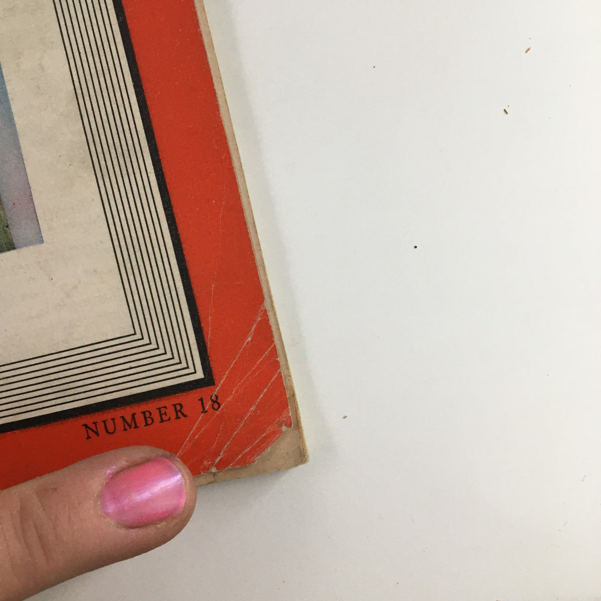 Close-up view of the spine of Time Magazine May 1 1939 Vol 33 #18, showing minor wear and Tattered edges, emphasizing its vintage condition.