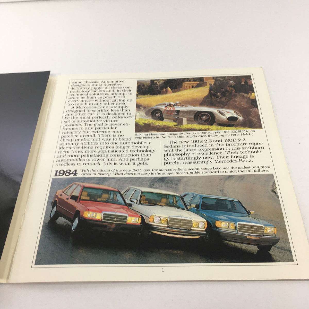 Interior page of the 1984 Mercedes-Benz 190E 2.3/190D 2.2 Dealership Car Auto Brochure, featuring multiple models and a historical context of Mercedes-Benz's engineering.