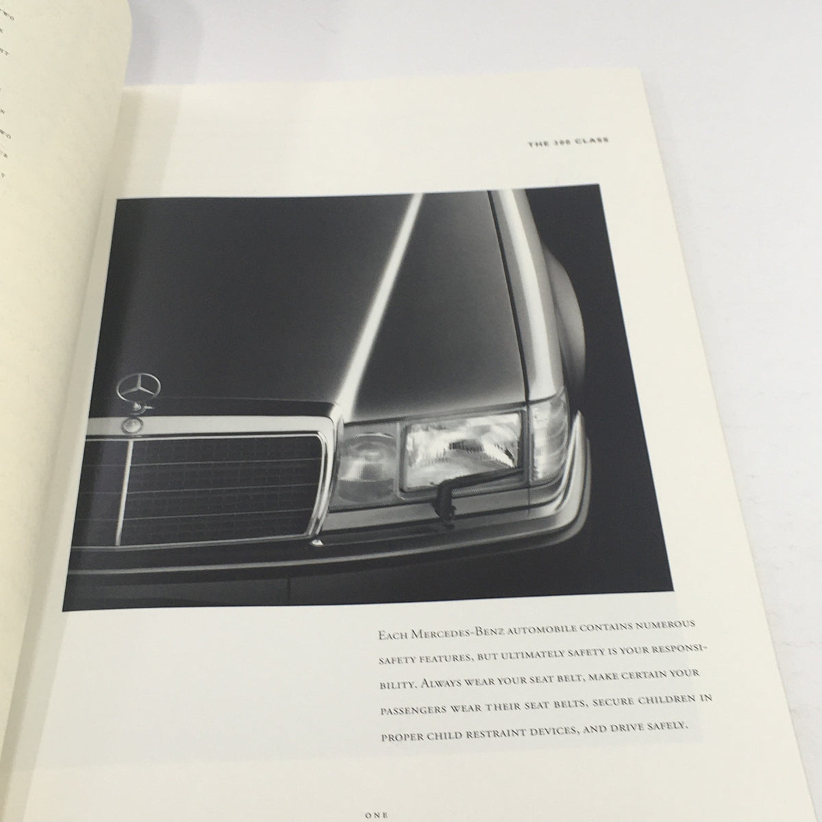 Interior page of the 1992 Mercedes-Benz 300-Class Dealership Car Auto Brochure Catalog with information on safety features and vehicle specifications.