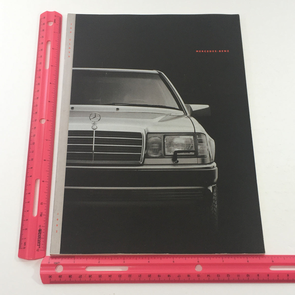 Front cover of the 1992 Mercedes-Benz 300-Class Dealership Car Auto Brochure Catalog, highlighting a prominent Mercedes-Benz vehicle with measurement guide.