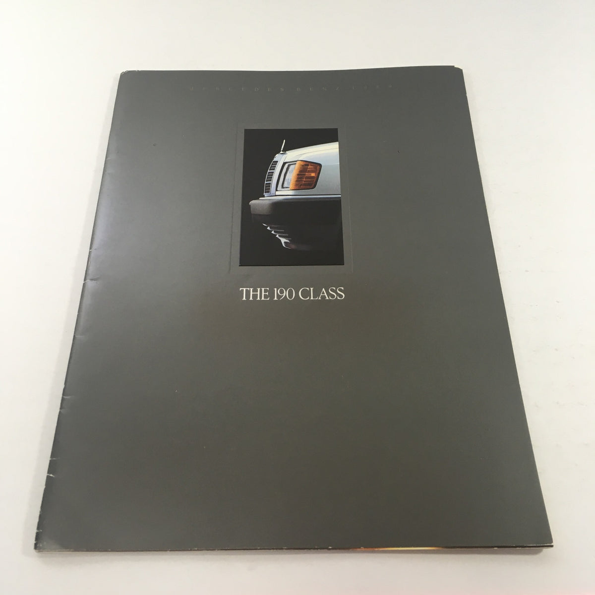 Cover of the 1989 Mercedes-Benz 190-Class Sedan Dealership Car Auto Brochure Catalog featuring the title 'THE 190 CLASS' and an image of the vehicle's front.