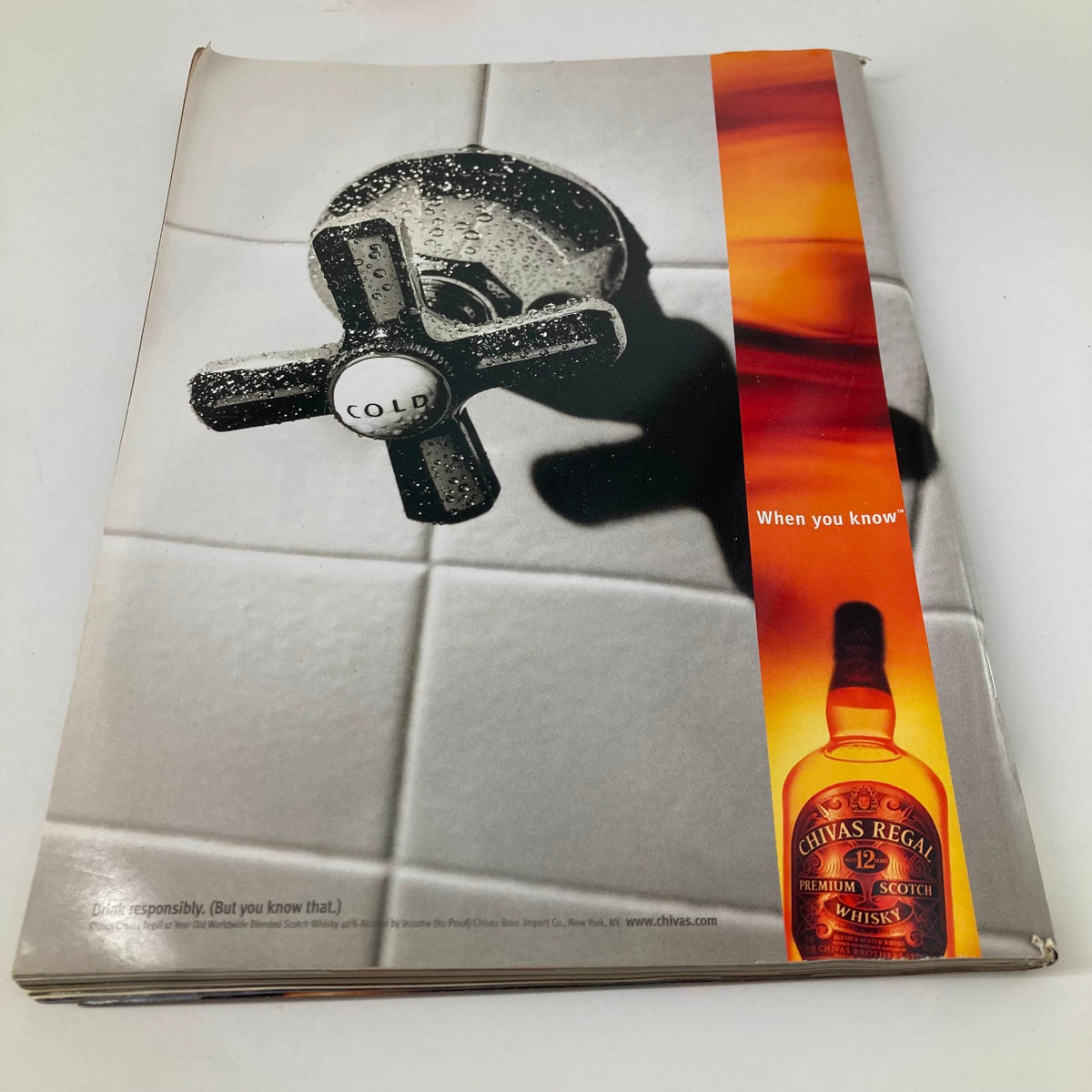 Back cover of Sports Illustrated Magazine Winter 2001 showcasing an advertisement for Chivas Regal whiskey, promoting responsible drinking.