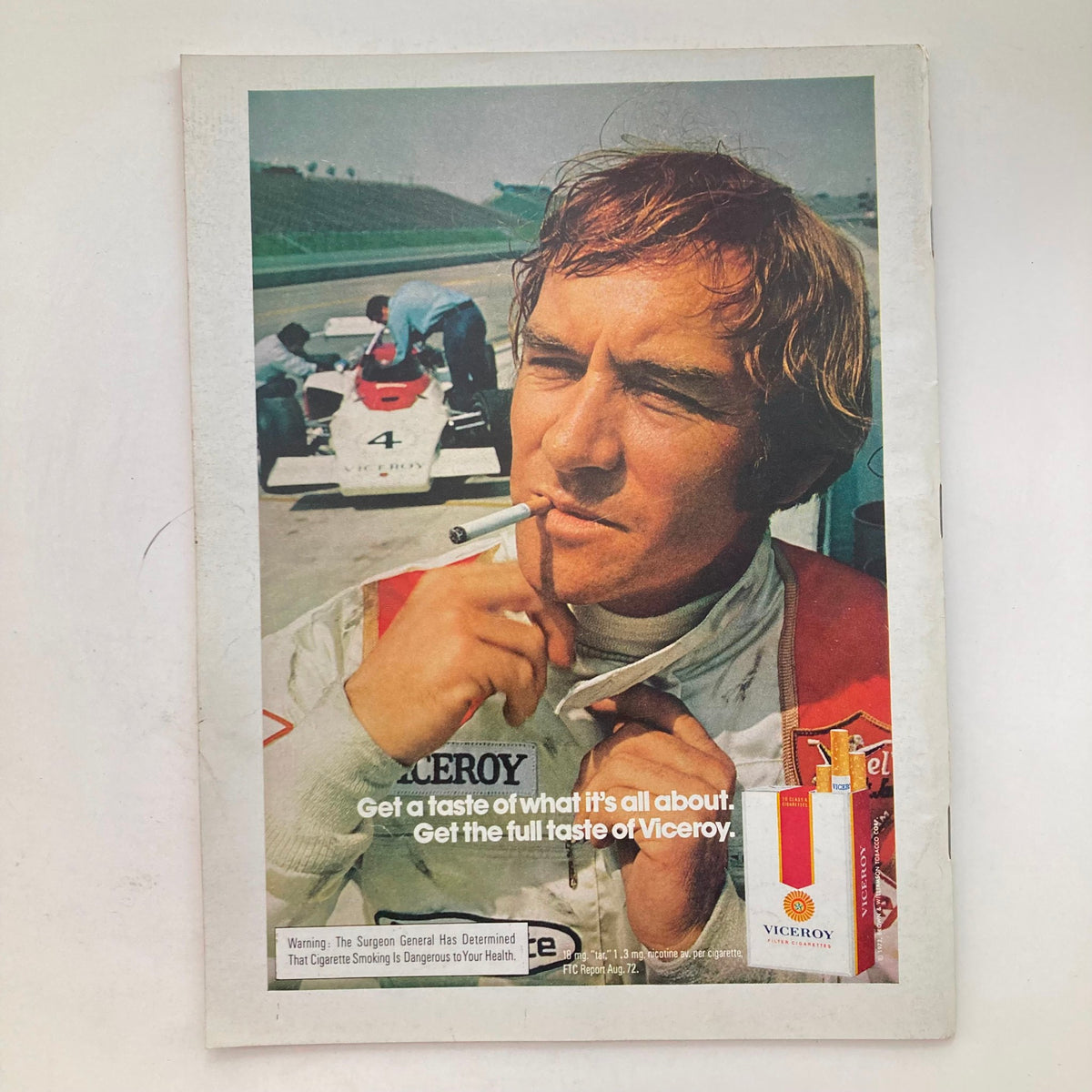 Advertisement from VTG Newsweek Magazine December 25, 1972, showcasing a race car driver with a Viceroy cigarette, reflecting the culture and trends of the 1970s.