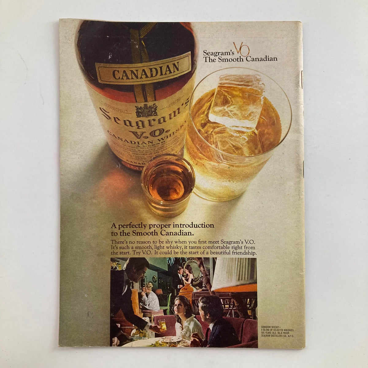 Back cover of the VTG Newsweek Magazine March 3 1969 advertising Seagram's V.O. Canadian whisky with a bottle and glass, featuring a setting of social interaction.