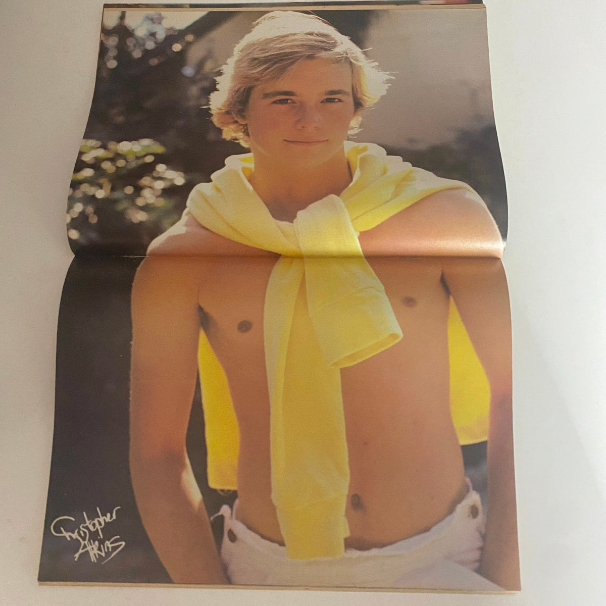 Vintage SuperTeen Magazine poster featuring a young male model with a yellow sweater draped over his shoulders, highlighted in the September 1981 issue.