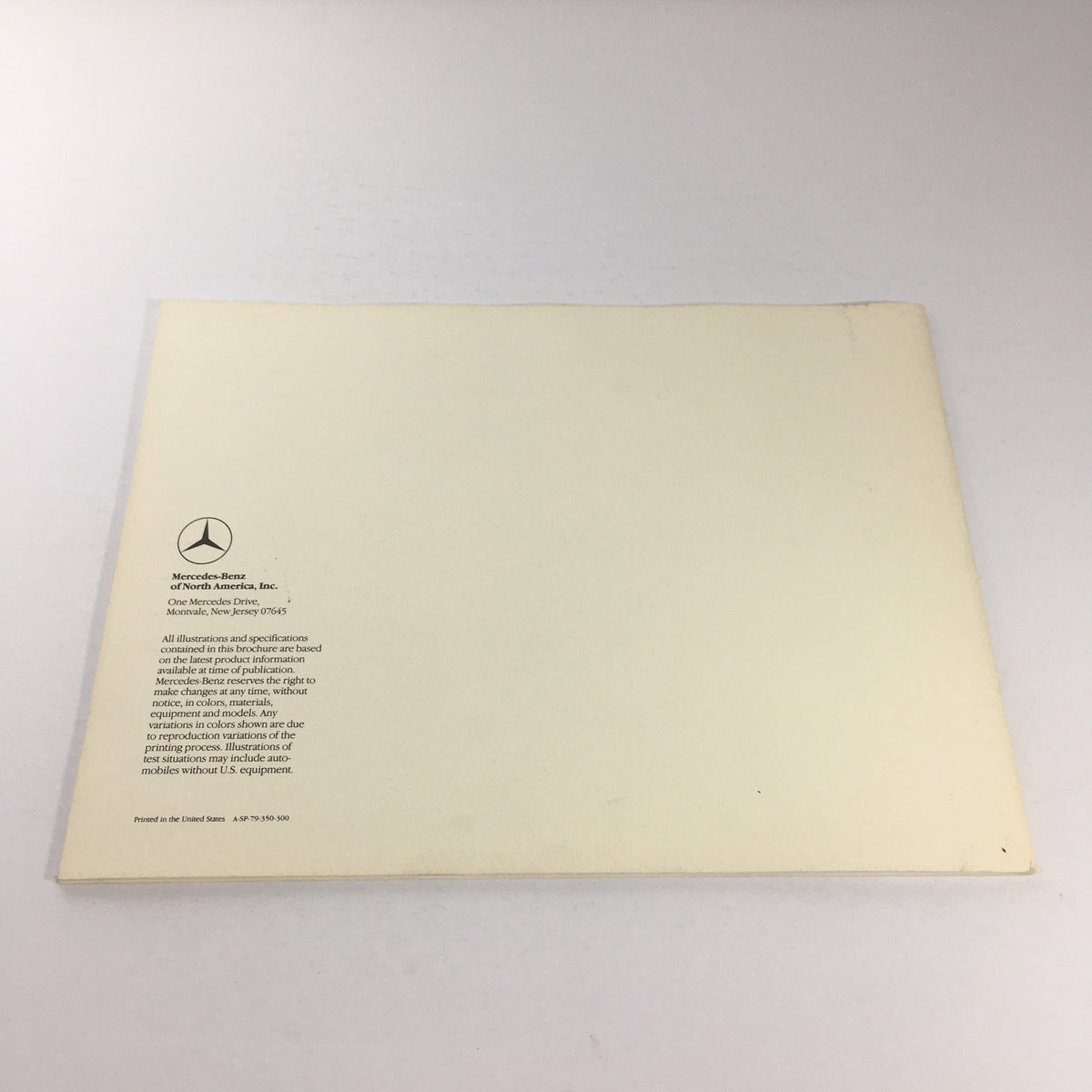 Back cover of the 1980 Mercedes-Benz 280CE Dealership Car Auto Brochure Catalog featuring the Mercedes-Benz logo and manufacturer information.