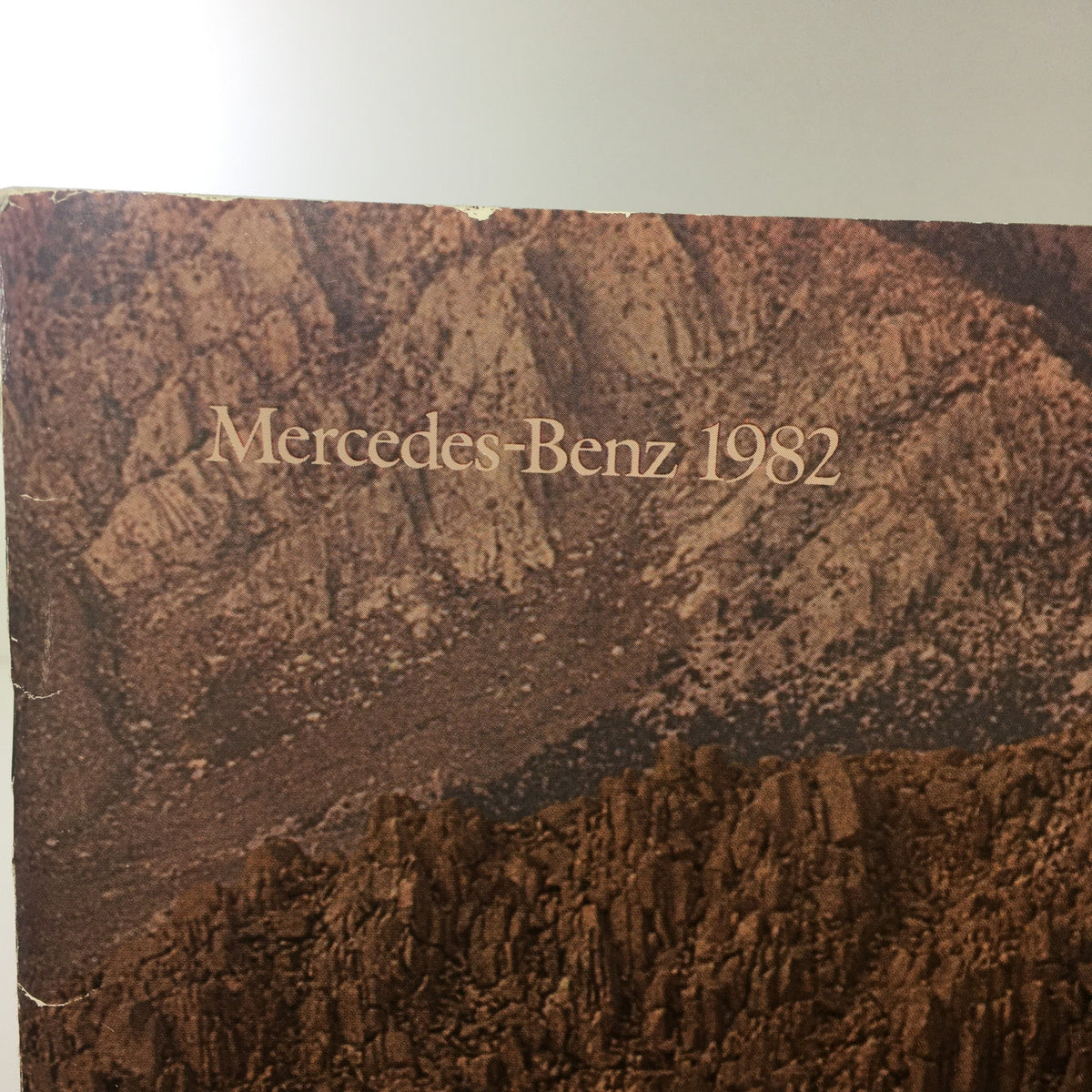 Close-up of the 1982 Mercedes-Benz 300-Turbodiesel Dealership Car Auto Brochure showing the title with a rugged mountain landscape in the background.