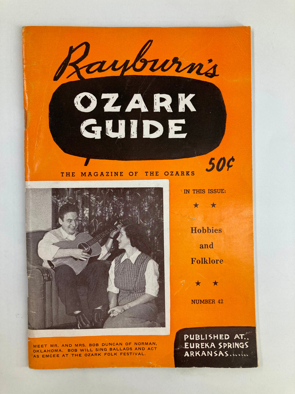 Rayburn's Ozark Guide Magazine Autumn 1954 featuring Mr. and Mrs. Bob Duncan on the cover with a photo of them and information about hobbies and folklore.