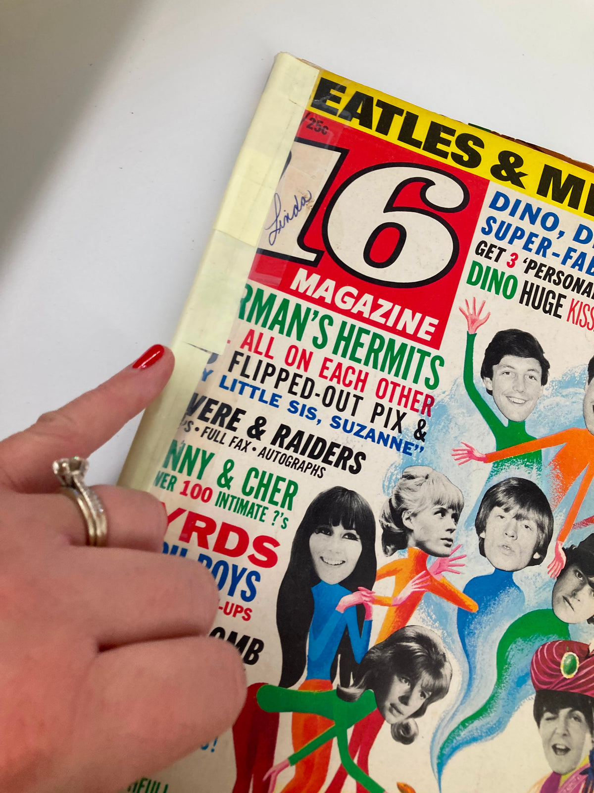 Close-up view of the cover of VTG 16 Magazine December 1965, highlighting the signature on the magazine, colorful graphics, and vibrant text about Dino, Desi, and Billy.