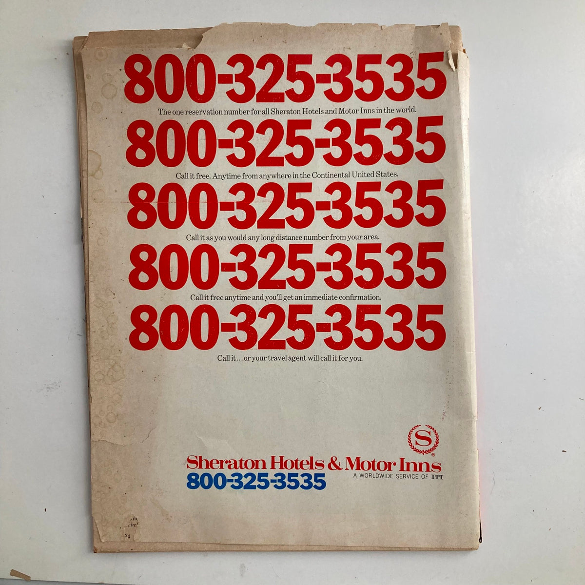 Back cover of VTG Time Magazine April 20 1970, featuring advertisement for Sheraton Hotels with the contact number 800-325-3535, highlighting period marketing styles.