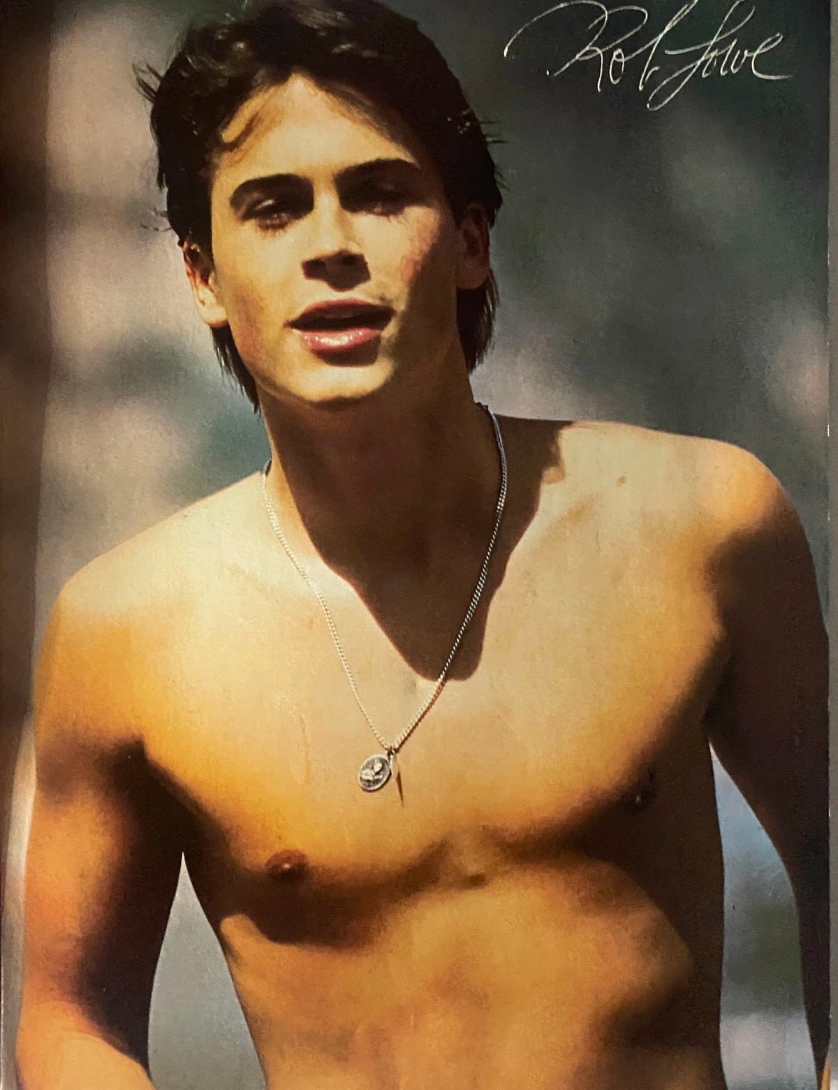 Rob Lowe featured in a pinup from SuperTeen Magazine February 1984 showcasing his charm and youthful appeal.