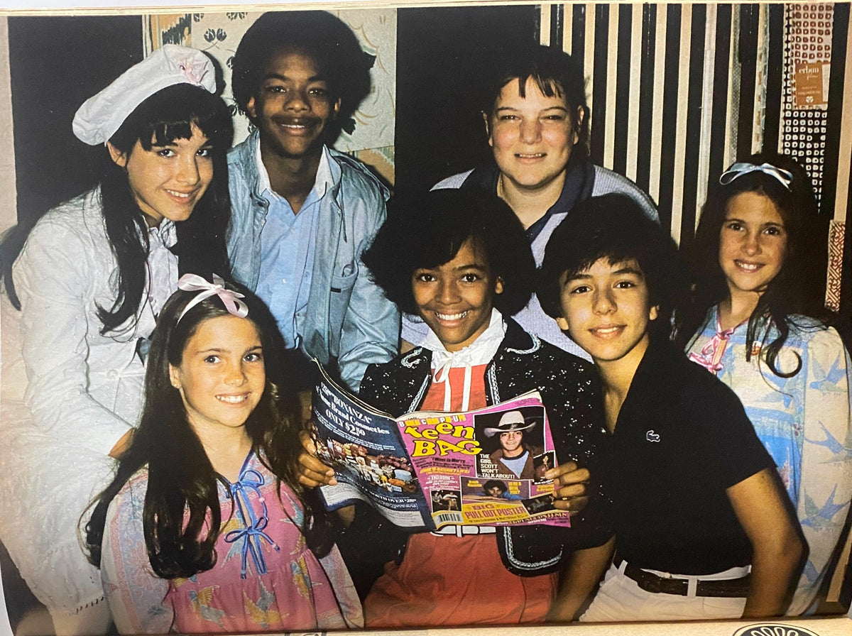 Teen Bag Magazine March 1982 featuring Rick Springfield and Scott Baio - Group of young actors and fans posing together, proudly holding a copy of Teen Bag Magazine, representing 1980s teen culture.