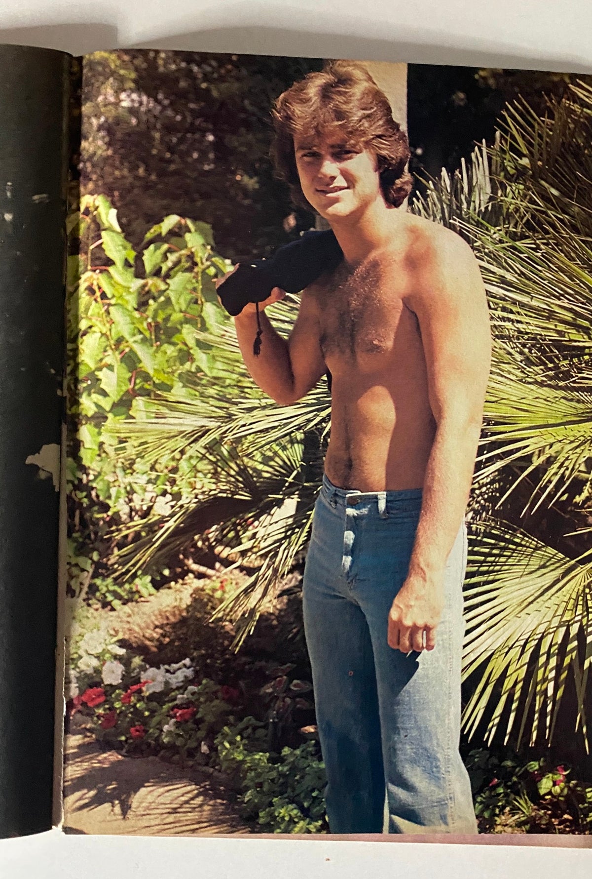 Colorful photo of a young man at a garden from Teen Pin-Ups Magazine June 1981, emphasizing youthful charm.