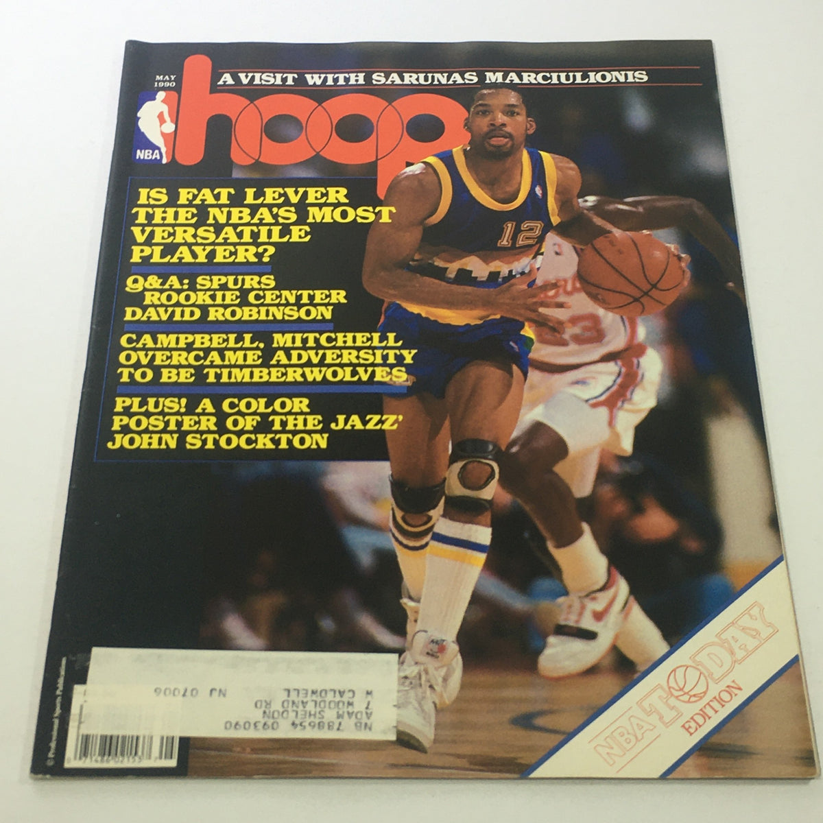 Cover of Hoop NBA Magazine, May 1990, featuring Lafayette 'Fat' Lever, highlighting the question 'Is Fat Lever the NBA's Most Versatile Player?' along with Q&A with Spurs rookie David Robinson and a color poster of John Stockton.