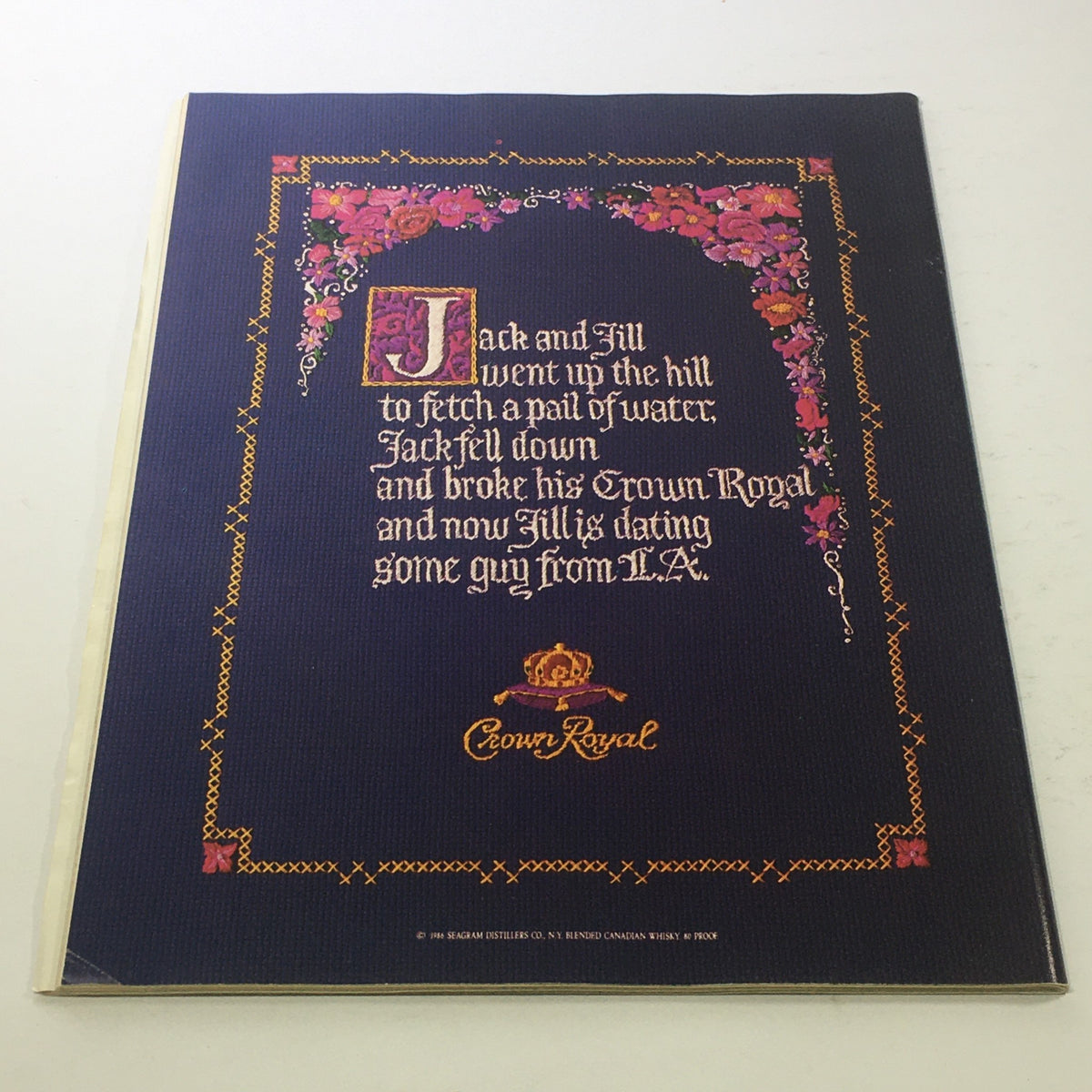 Back cover of Hoop NBA Magazine 1988 featuring a humorous Crown Royal advertisement.
