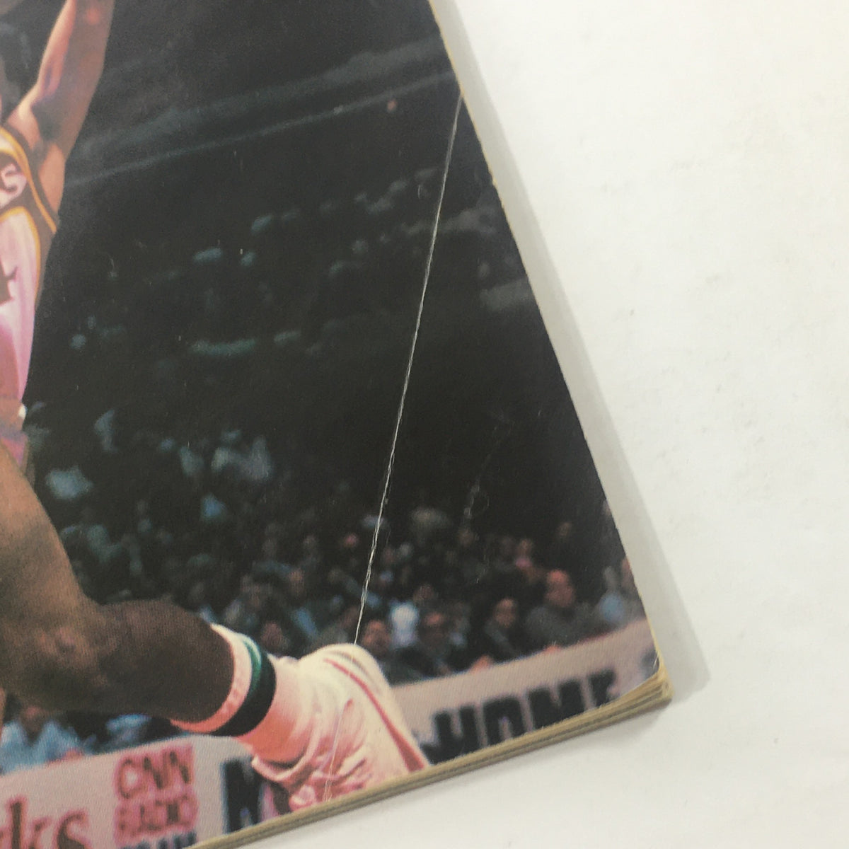 Detail view of the Hoop NBA Magazine page, showcasing player action and the unique design elements from the 1980s, featuring Terry Cummings.