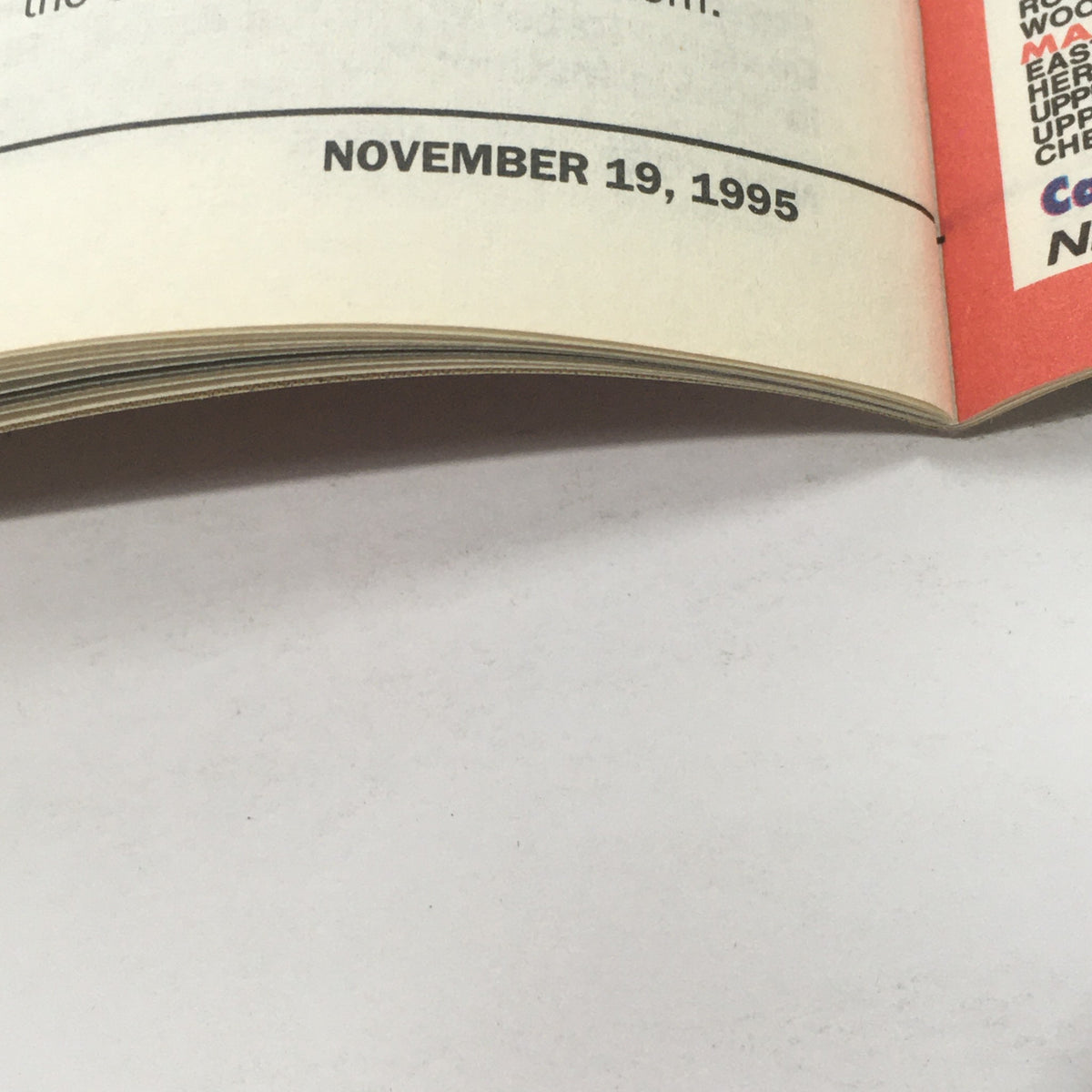 Close-up view of a page from the 'Daily News Magazine: November 19 1995 - 100 Years Of Movie Magic', showing the date and layout of the magazine.