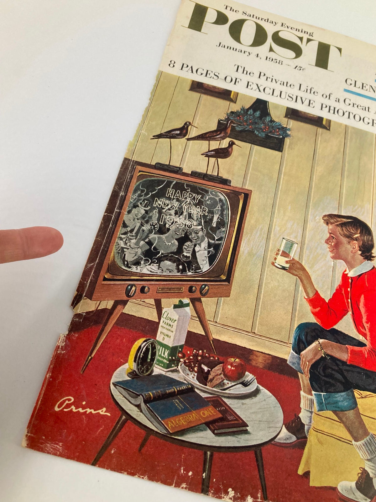 COVER ONLY of The Saturday Evening Post from January 4, 1958, featuring a nostalgic illustration of a boy watching a television set with a festive 'Happy New Year 1958' message, showcasing vintage decor and elements from the late 1950s.