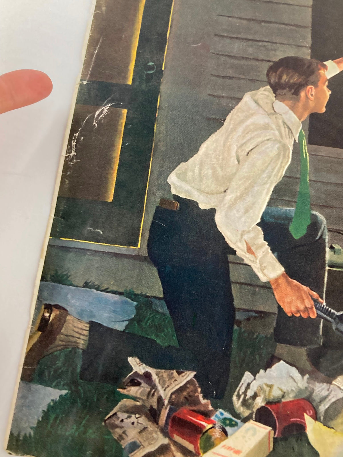 Close-up of The Saturday Evening Post cover from October 3, 1959, showcasing a man in a white shirt and green tie, pointing towards a window. The scene includes surrounding debris, making it a unique collectible for fans of Perry Mason and vintage television.