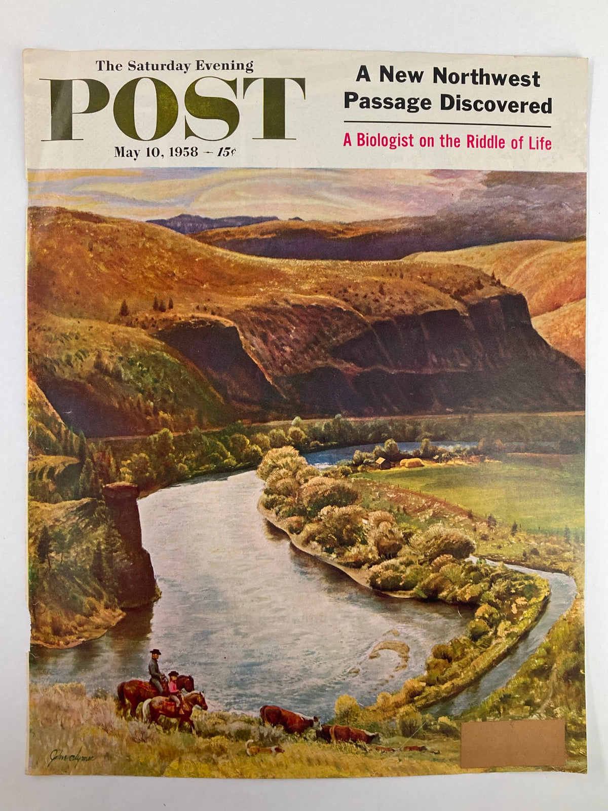 Cover of The Saturday Evening Post May 10, 1958, titled 'A New Northwest Passage Discovered', showcasing a scenic view of a river and hills with cattle, capturing the essence of mid-20th-century American culture.