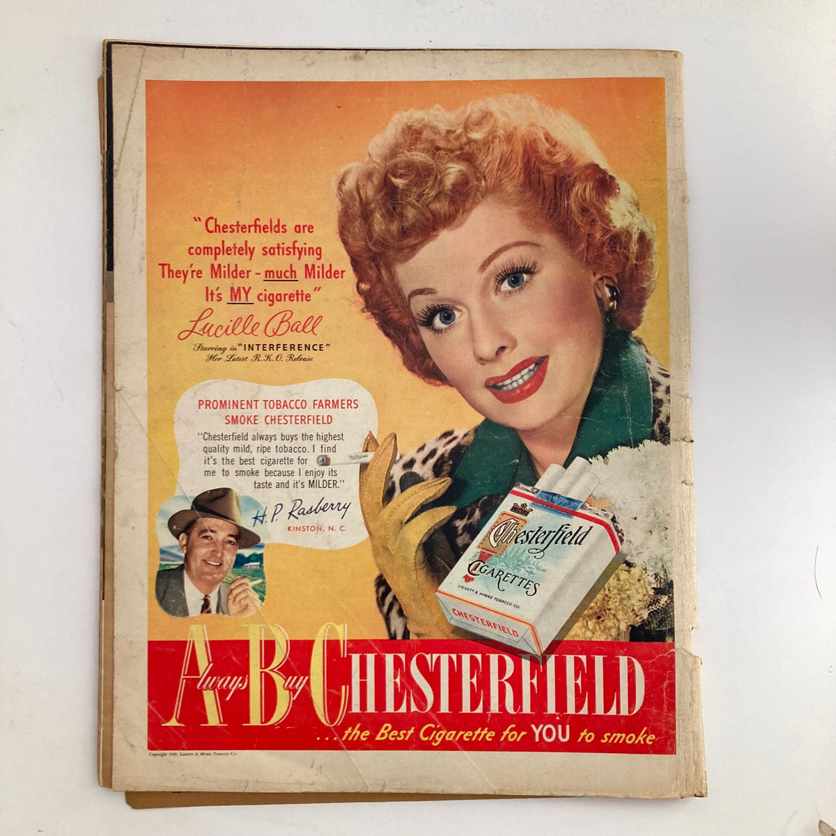 Vintage Look Magazine from September 27, 1949 featuring Jackie Robinson as Ball Player of the Year, alongside an advertisement for Chesterfield cigarettes with Lucille Ball.