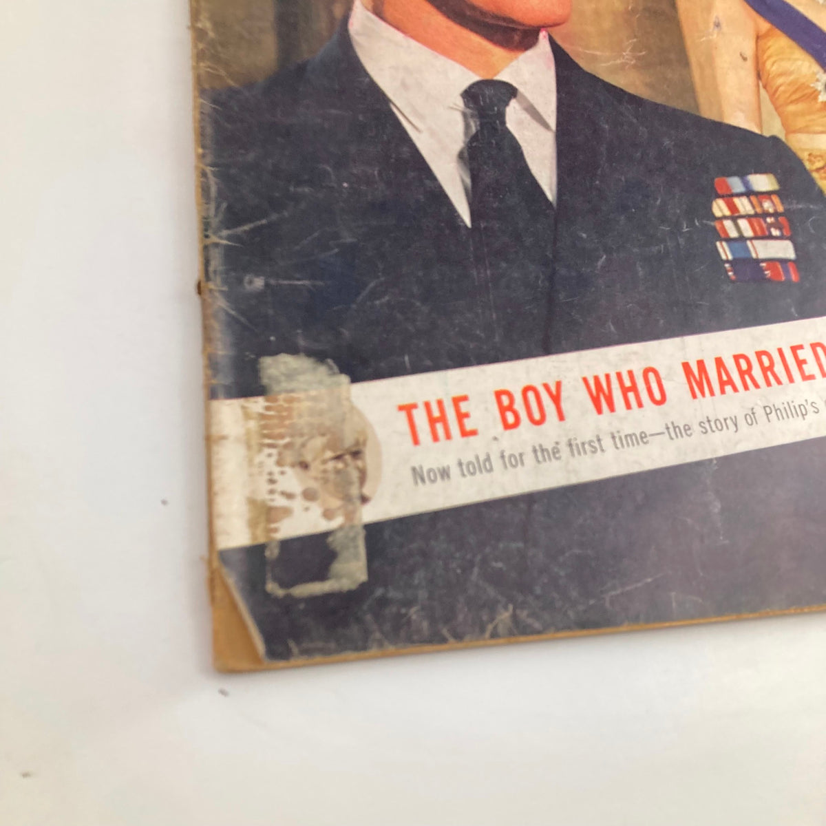 Close-up view of the cover of VTG Look Magazine April 6 1954, highlighting the title 'The Boy Who Married the Queen'.