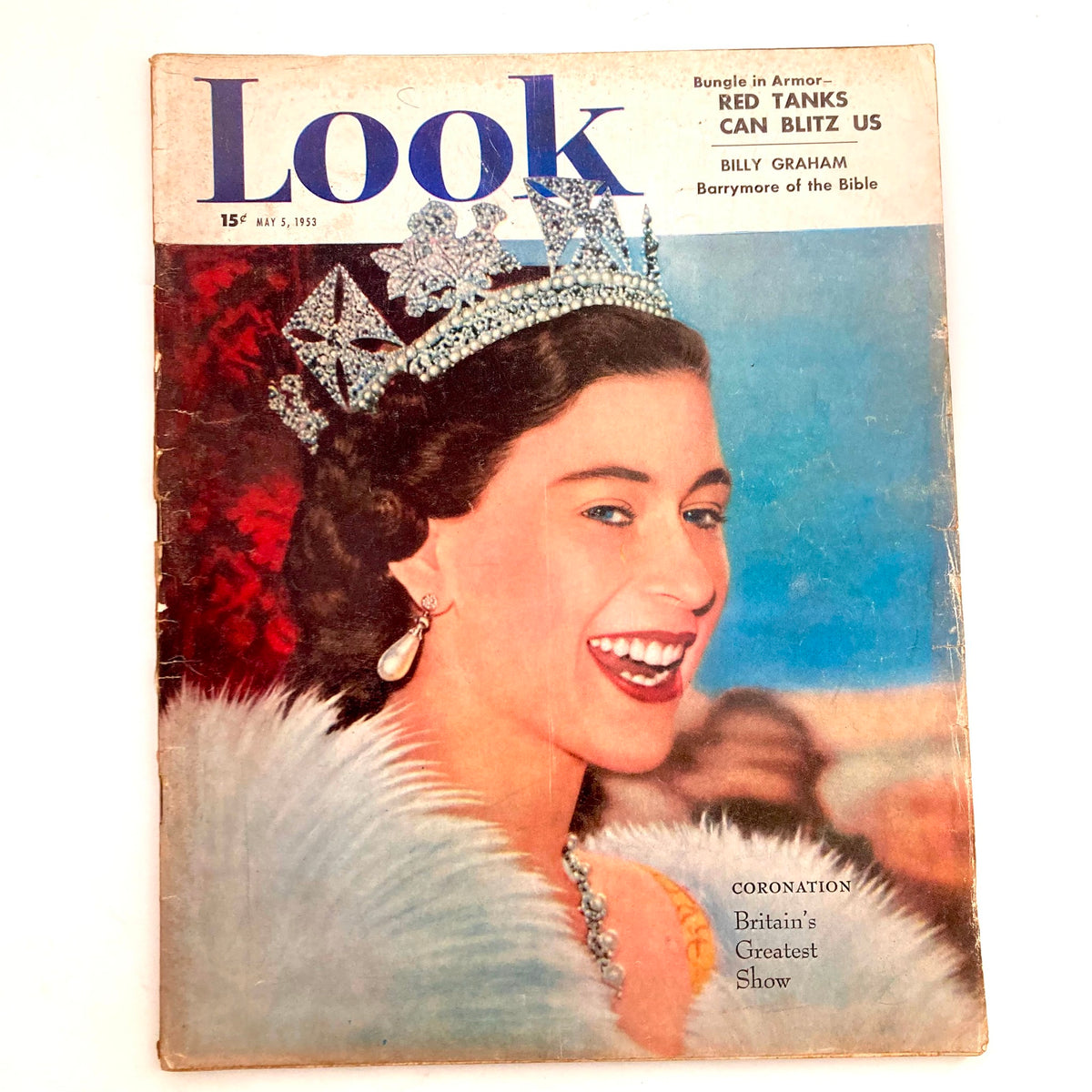 Cover of VTG Look Magazine May 10, 1953 featuring the Coronation of Queen Elizabeth II, showcasing the queen in a crown with a cheerful expression and fur cape.