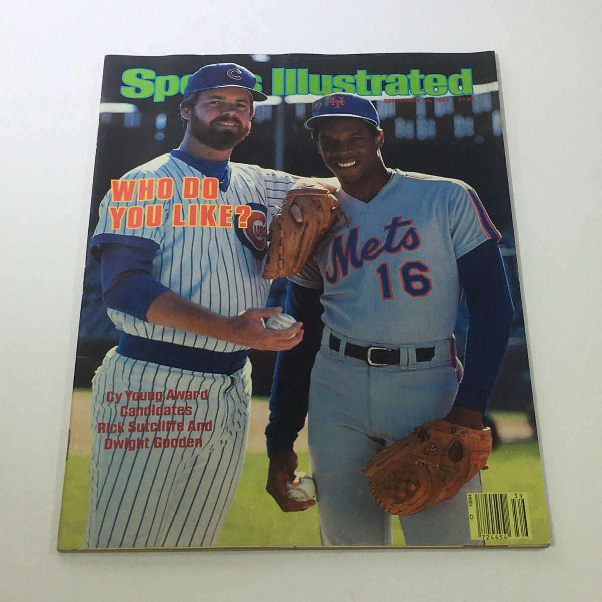Cover of Sports Illustrated: September 8 1984 featuring MLB players Rick Sutcliffe and Dwight Gooden, with the title 'WHO DO YOU LIKE?' highlighted. The players are shown in their respective team uniforms, showcasing a moment from baseball history.