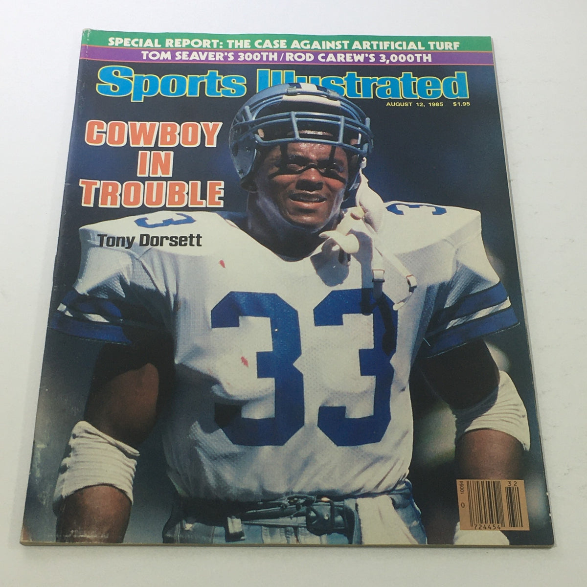 Cover of Sports Illustrated magazine dated August 12, 1985, featuring NFL star Tony Dorsett with the headline 'Cowboy In Trouble.' This vintage magazine highlights sports history and the 1985 Dallas Cowboys challenges.
