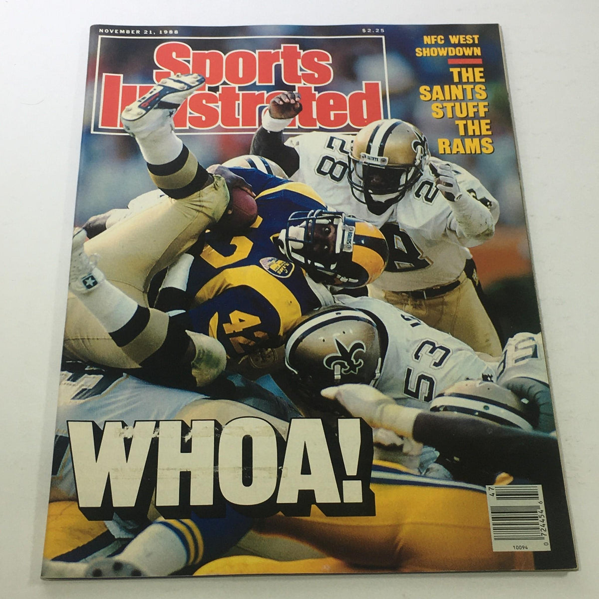 Cover of Sports Illustrated: November 21, 1988 featuring an NFC West Showdown between the New Orleans Saints and Los Angeles Rams with dynamic football action, headline 'WHOA!', showcasing key players in a dramatic moment.