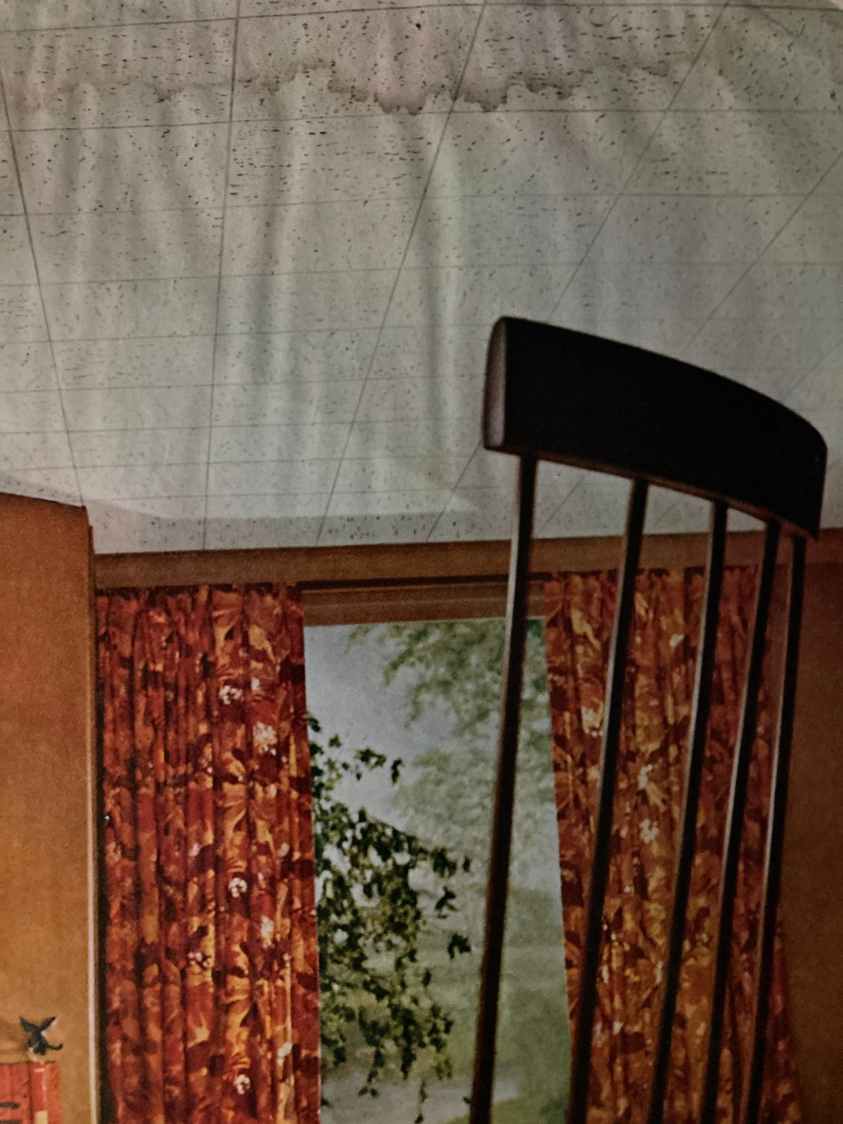 Interior view featuring vintage decor, including patterned curtains and a chair, related to the COVER ONLY edition of The Saturday Evening Post March 12 1960 by Larry Sherry.