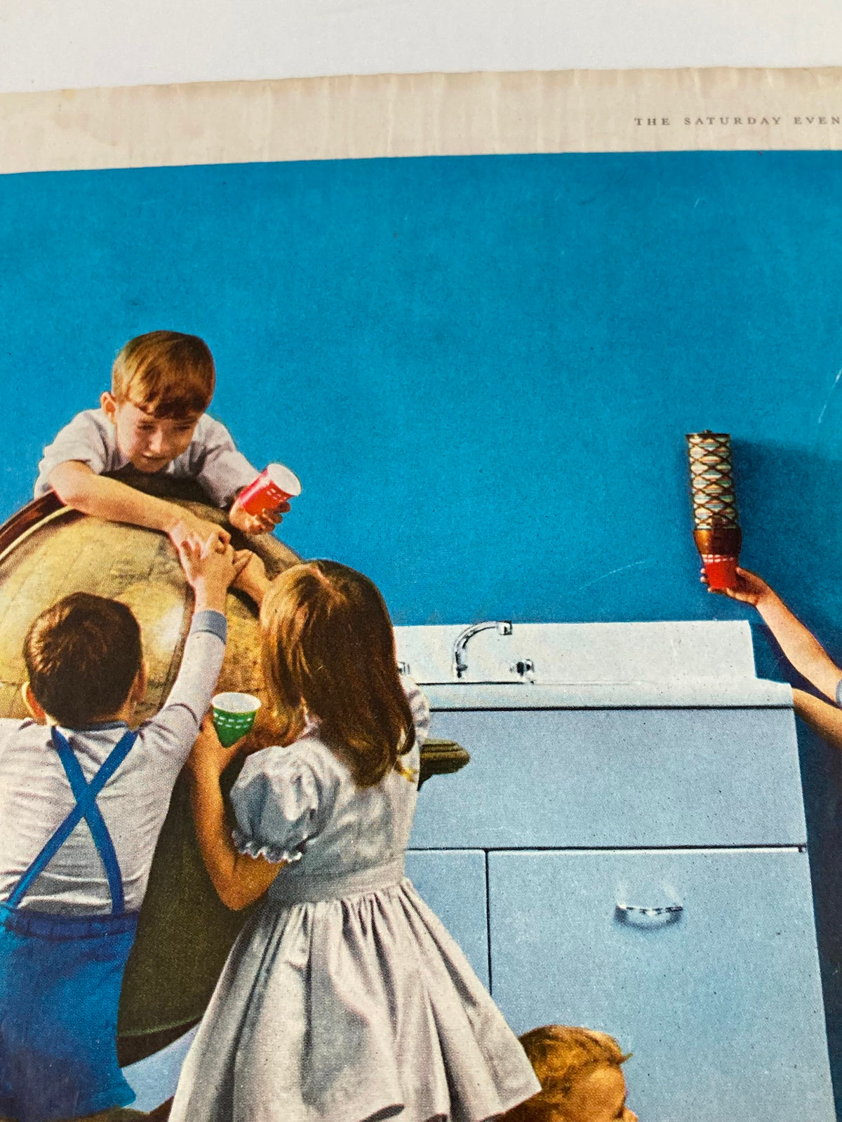 Cover of The Saturday Evening Post May 14, 1960 showing children engaged in playful activities, capturing a nostalgic moment from the past.