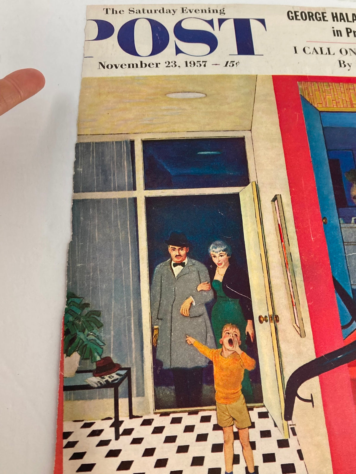 Close-up of the cover of The Saturday Evening Post November 23 1957 highlighting George Halas with background detail of guests entering a home.