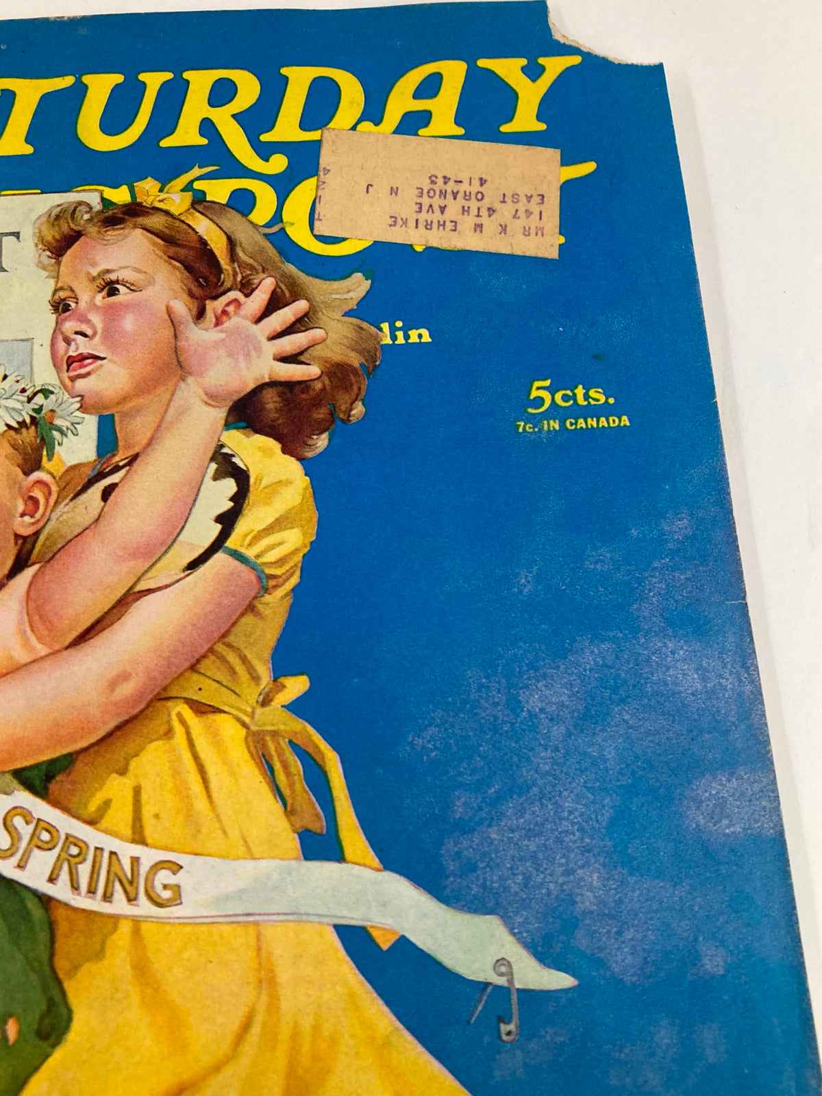 Detail shot of The Saturday Evening Post April 12 1941 cover showing the title 'Will We Have Inflation?' by Harry Scherman and the artistic depiction of children celebrating spring.