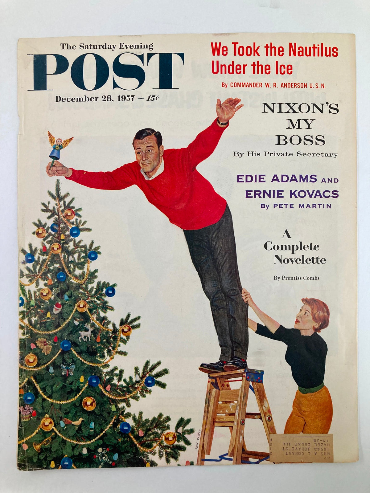 Vintage cover of The Saturday Evening Post from December 28, 1957 featuring Edie Adams and Ernie Kovacs, showcasing a Christmas theme with a decorated tree and festive colors.