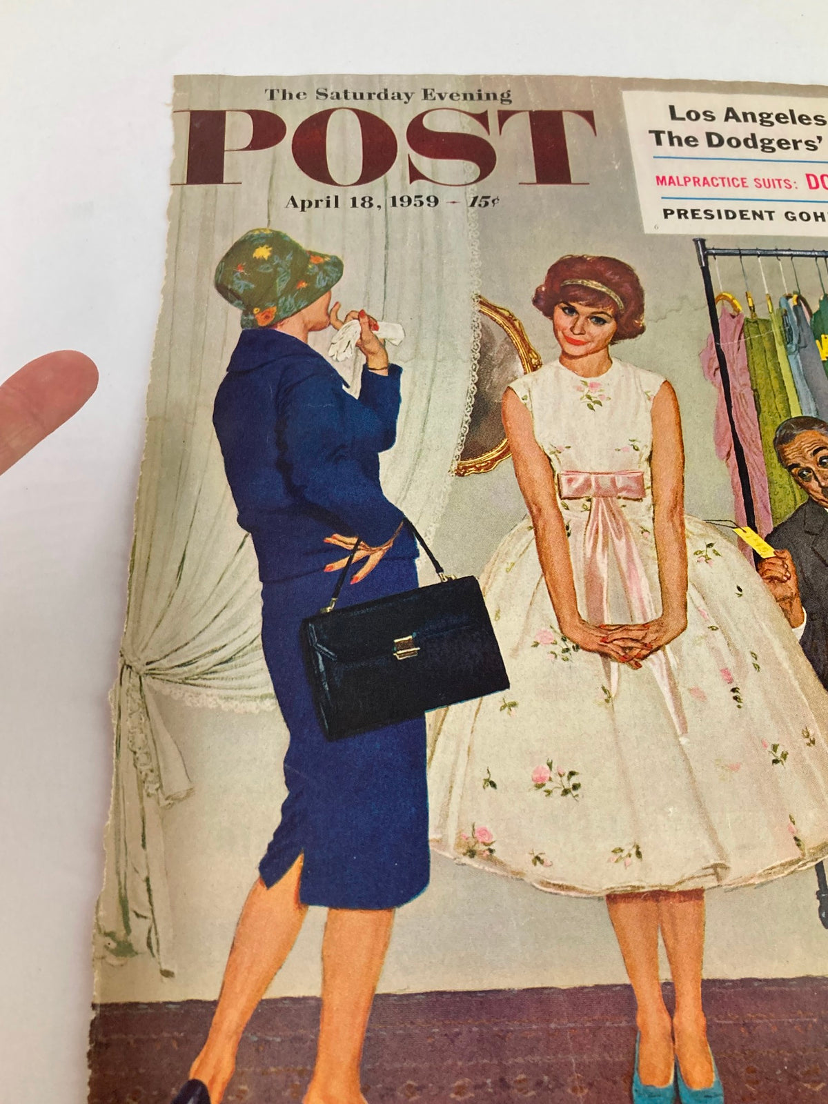Vintage magazine cover featuring The Saturday Evening Post from April 18, 1959, showcasing a stylish woman in a blue outfit and a green floral hat, alongside another woman in a white dress with floral patterns, highlighting the historical significance of President Goheen of Princeton.