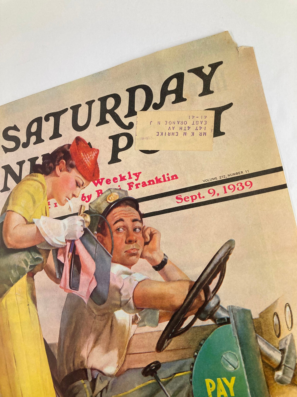 Detailed view of The Saturday Evening Post cover from September 9, 1939 highlighting the bus driver and woman, with the title and date prominently displayed.
