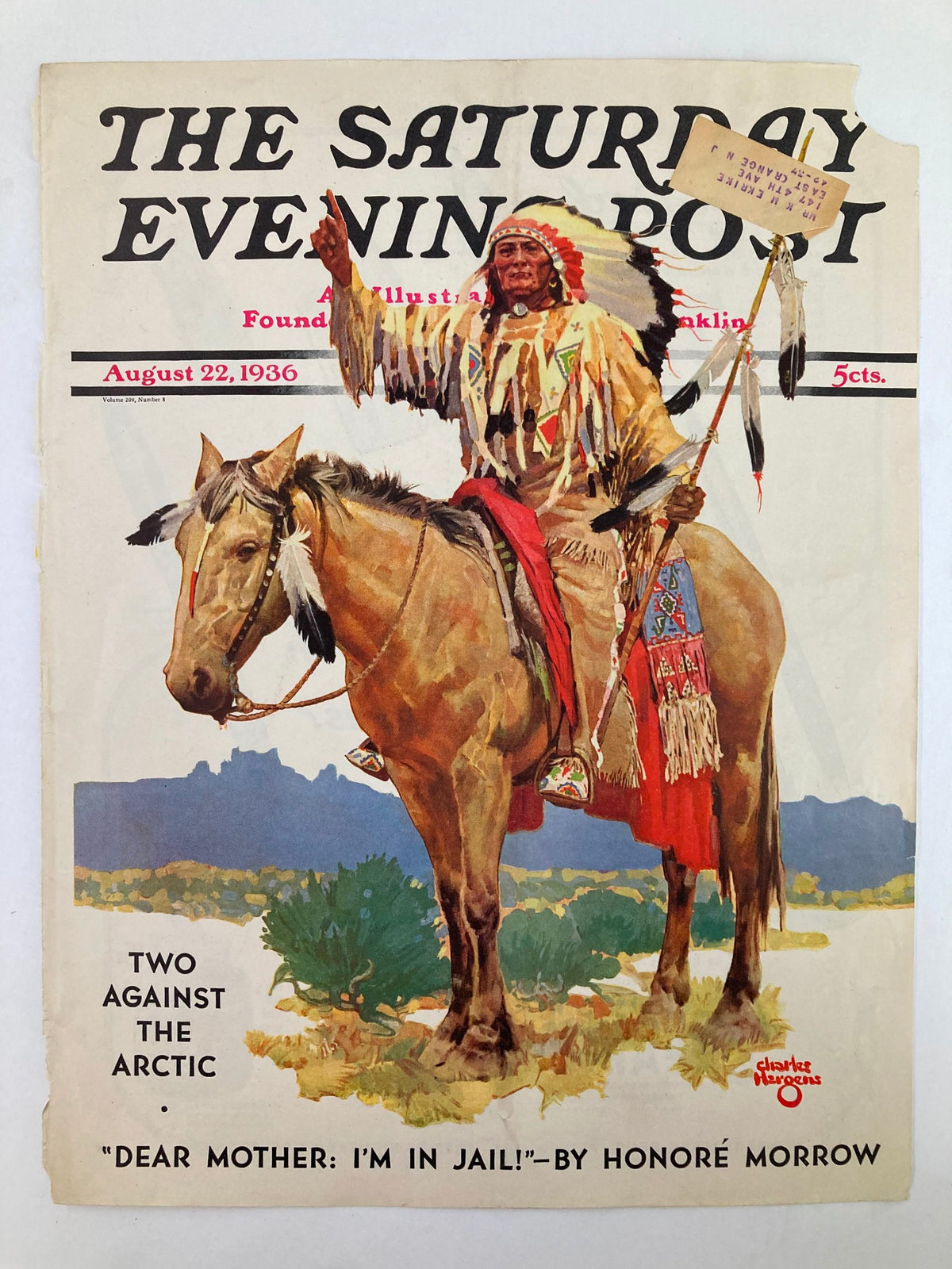 Cover image of The Saturday Evening Post from August 22, 1936, showcasing a Native American chief on horseback, wearing a feather headdress and traditional clothing, with a sign and the title 'Two Against The Arctic' along with the subtitle 'Dear Mother: I'm in Jail!' by Honoré Morrow.