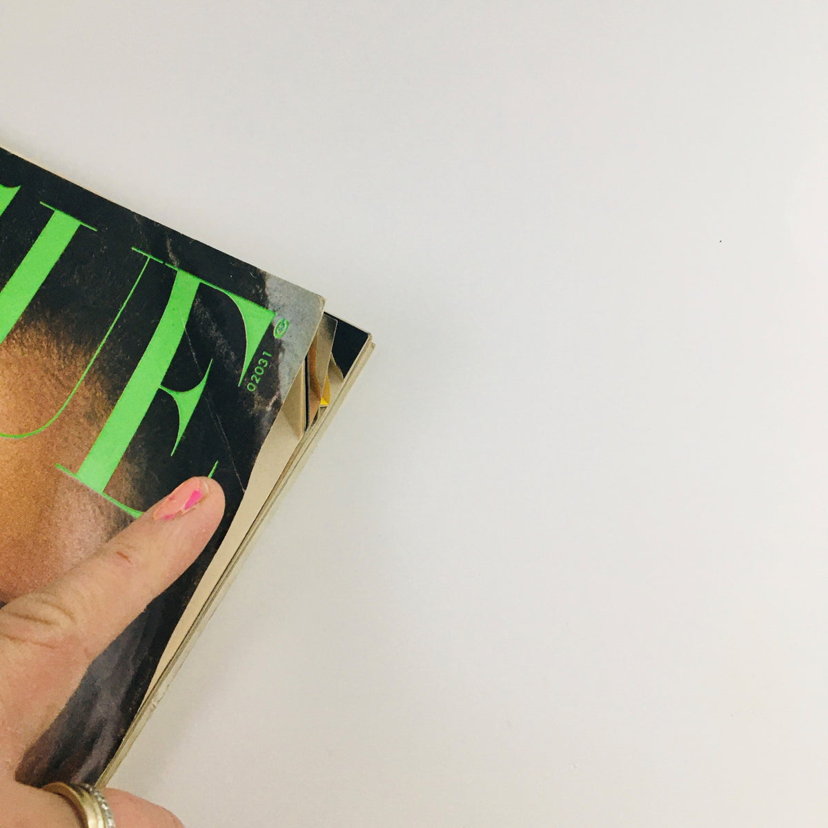 Close-up view of Vogue Magazine June 1975, showing the iconic cover with Beverly Johnson and details of the magazine's condition.