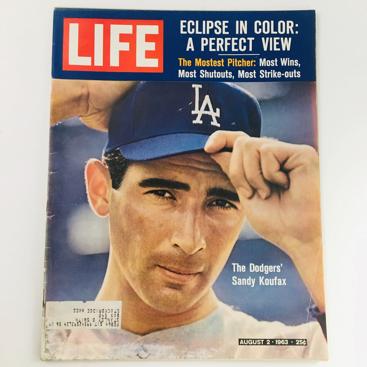 Cover of Life Magazine August 2, 1963, featuring the Dodgers' Sandy Koufax, showcasing the headline 'Eclipse in Color: A Perfect View.' The magazine highlights Koufax's achievements in baseball.