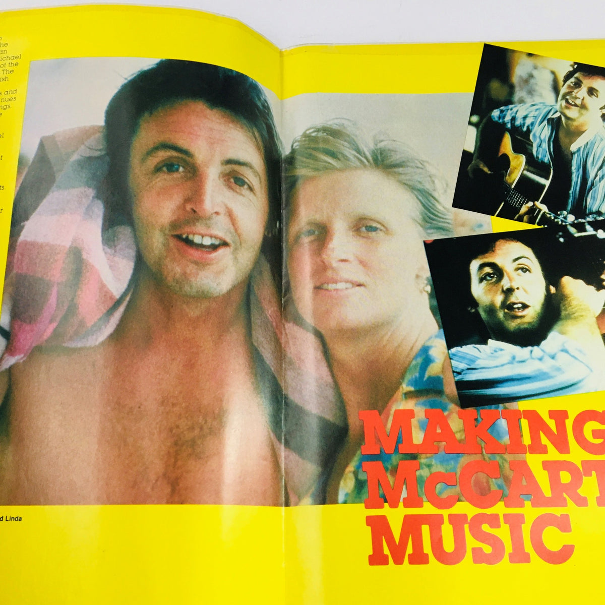 Interior spread of Pop TV Giants Poster Magazine 1984 with Paul and Linda McCartney, highlighting their music-making journey.