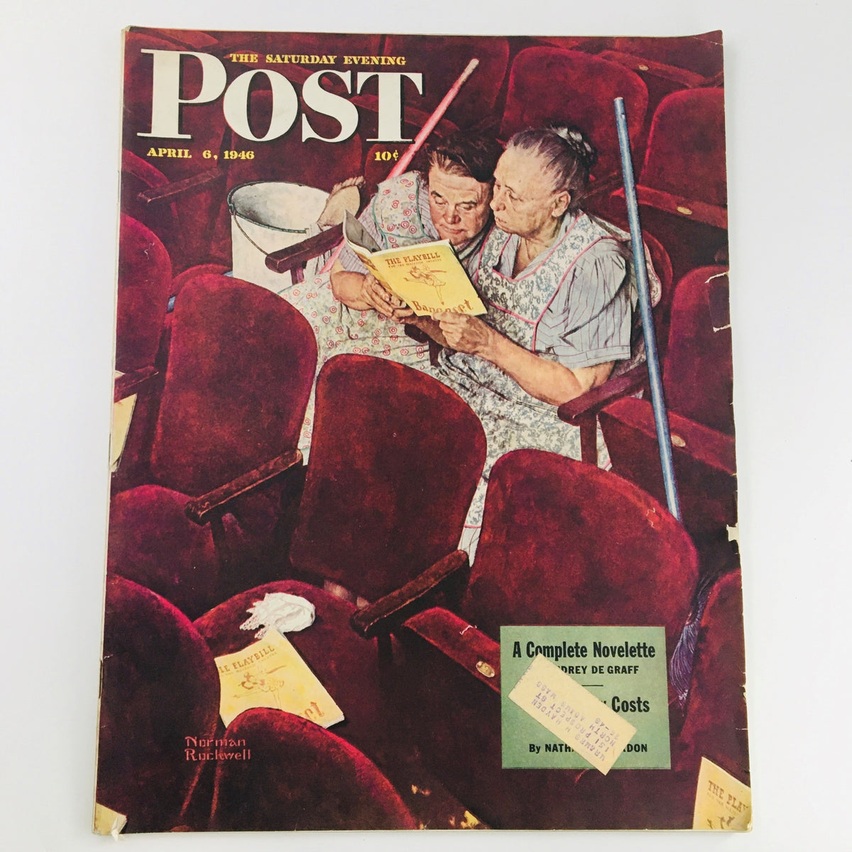 The Saturday Evening Post April 6 1946 Norman Rockwell Painting Playbill Cover featuring two women reading a playbill in red theater seats, showcasing vintage Americana.