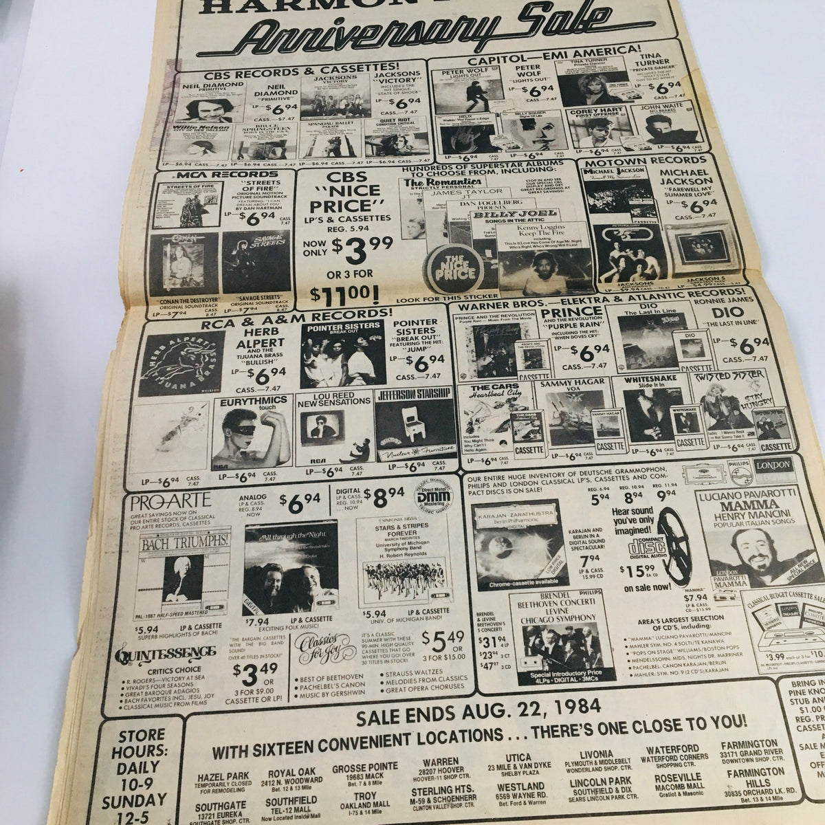 Advertisement page from the Detroit Free Press August 17 1984, showcasing the HARMONY Anniversary Sale with featured records and cassette discounts.