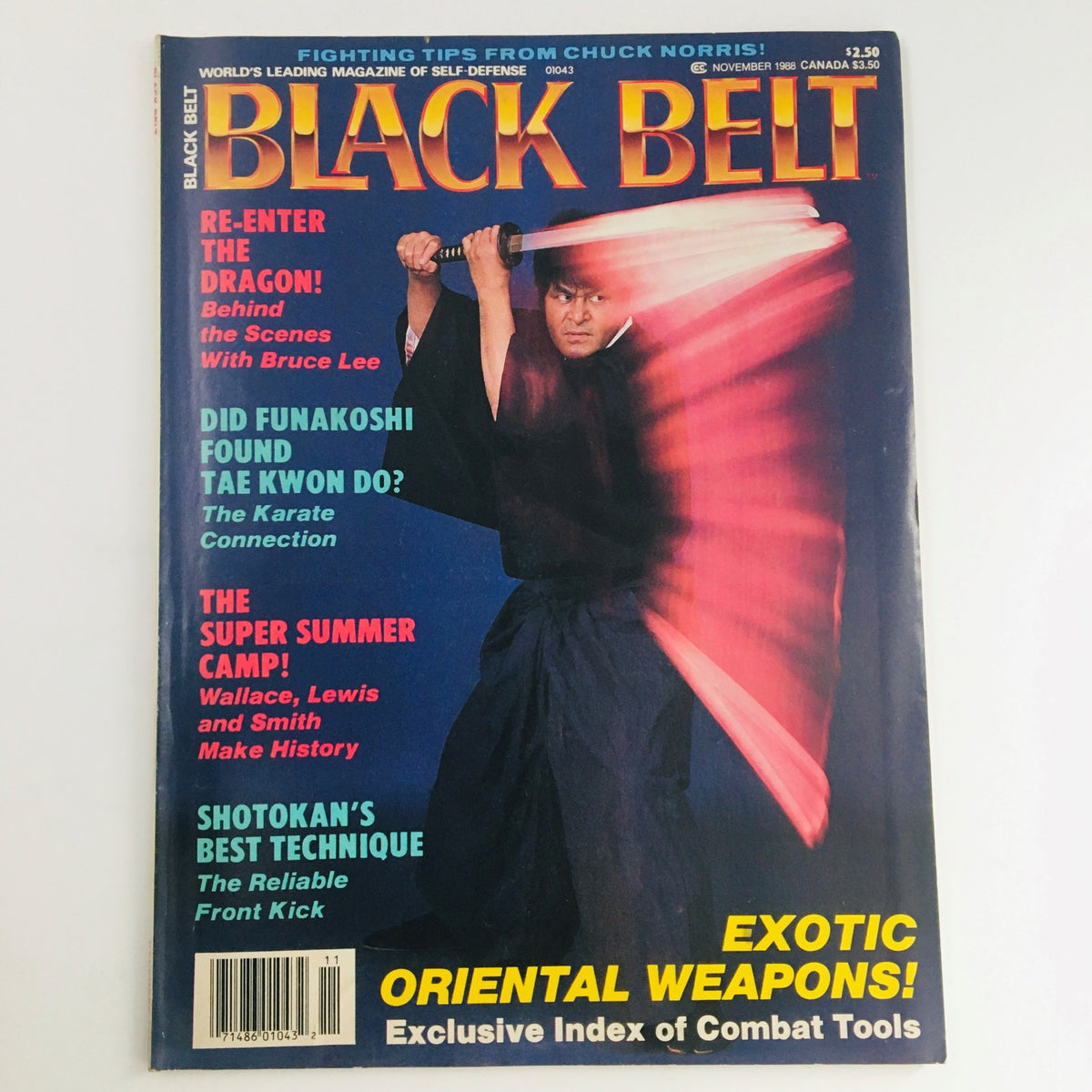 Cover of Black Belt Magazine, November 1988, Vol 26 #11 featuring martial artist Tadashi Yamashita wielding a sword with dynamic motion effects. The magazine highlights articles on Oriental weapons and martial arts culture.