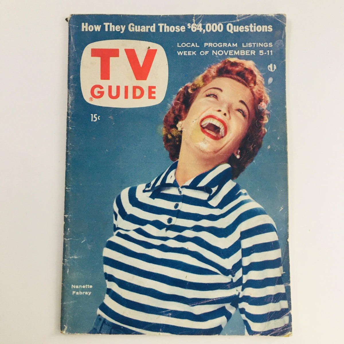 Cover of TV Guide Magazine November 5 1955, featuring American actress Nanette Fabray laughing joyfully in a striped shirt, showcasing the vibrant style of mid-20th century television.