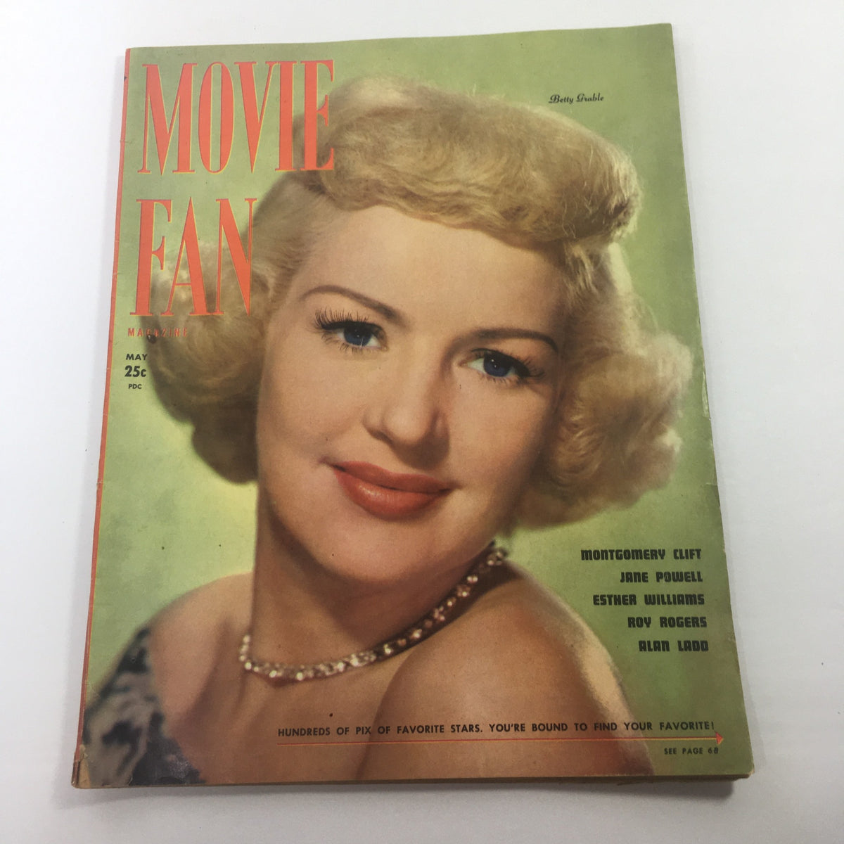 Cover of Movie Fan Magazine: May 1950 featuring Betty Grable with a glamorous hairstyle and makeup, celebrating iconic Hollywood stars including Montgomery Clift and Jane Powell.