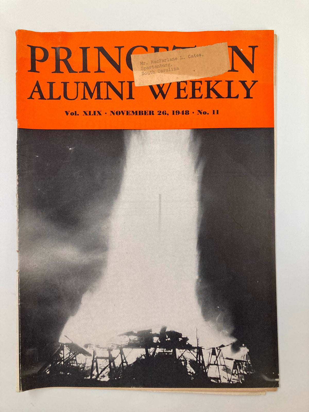 Cover of the VTG Princeton Alumni Weekly, November 26, 1948, featuring a photograph with smoke visuals. The title is prominently displayed along with the volume and issue number. A label on the cover indicates the recipient's name and location, adding historical significance.