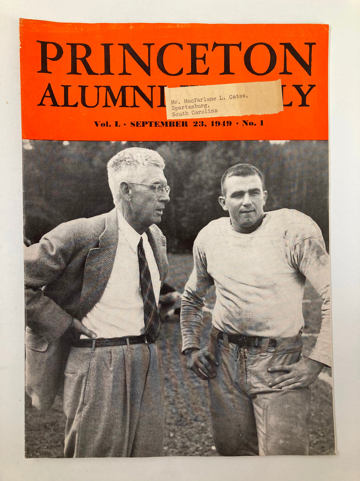 Cover of VTG Princeton Alumni Weekly September 23, 1949, featuring two men, one in a suit and the other in a football jersey, showcasing historical Princeton memorabilia.