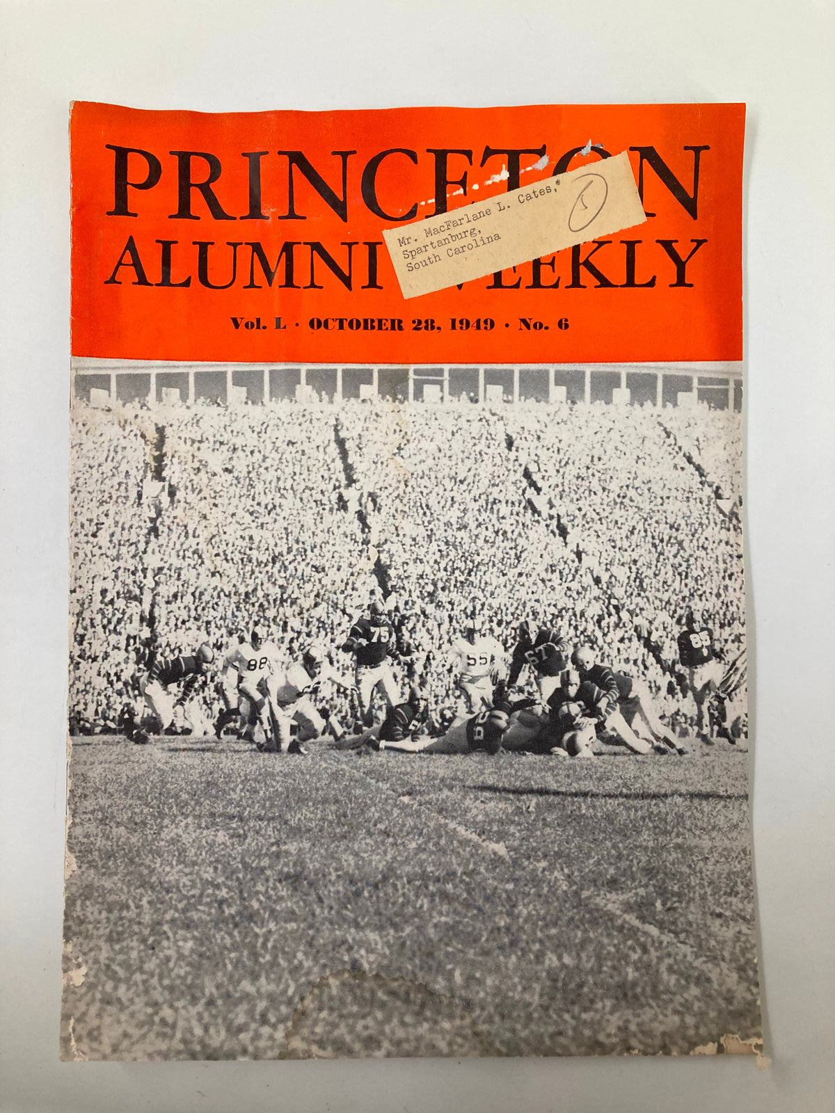 Cover of the VTG Princeton Alumni Weekly, dated October 28, 1949, featuring a football game scene with an orange header. This vintage publication captures the essence of Princeton University's history.